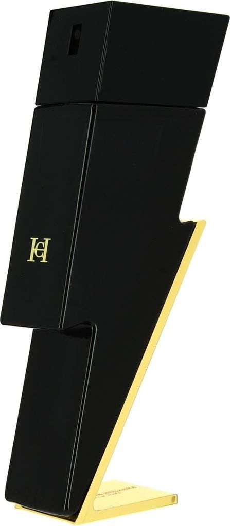 A black and gold lightning bolt-shaped perfume bottle.
