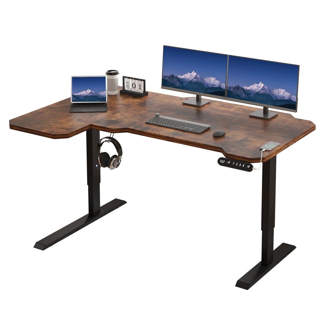 A corner standing desk with dual monitors, a laptop, and accessories.