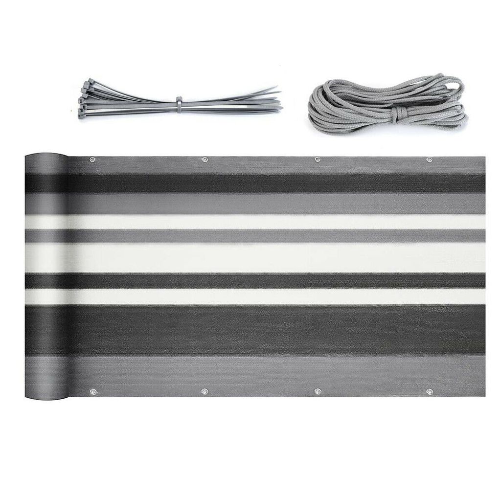 A rolled-up balcony privacy screen with attached accessories.