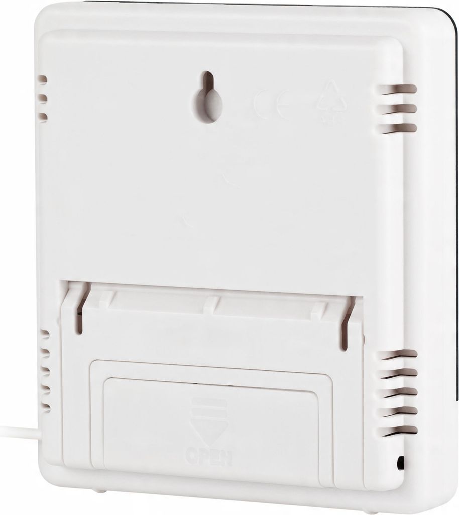 The back of a white digital weather station is shown, with a battery compartment and a hanging slot.