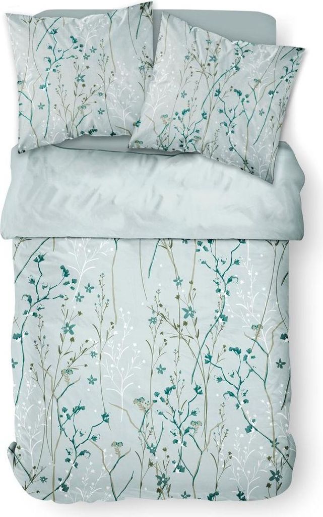 A top-down view of a bedding set with a floral pattern.
