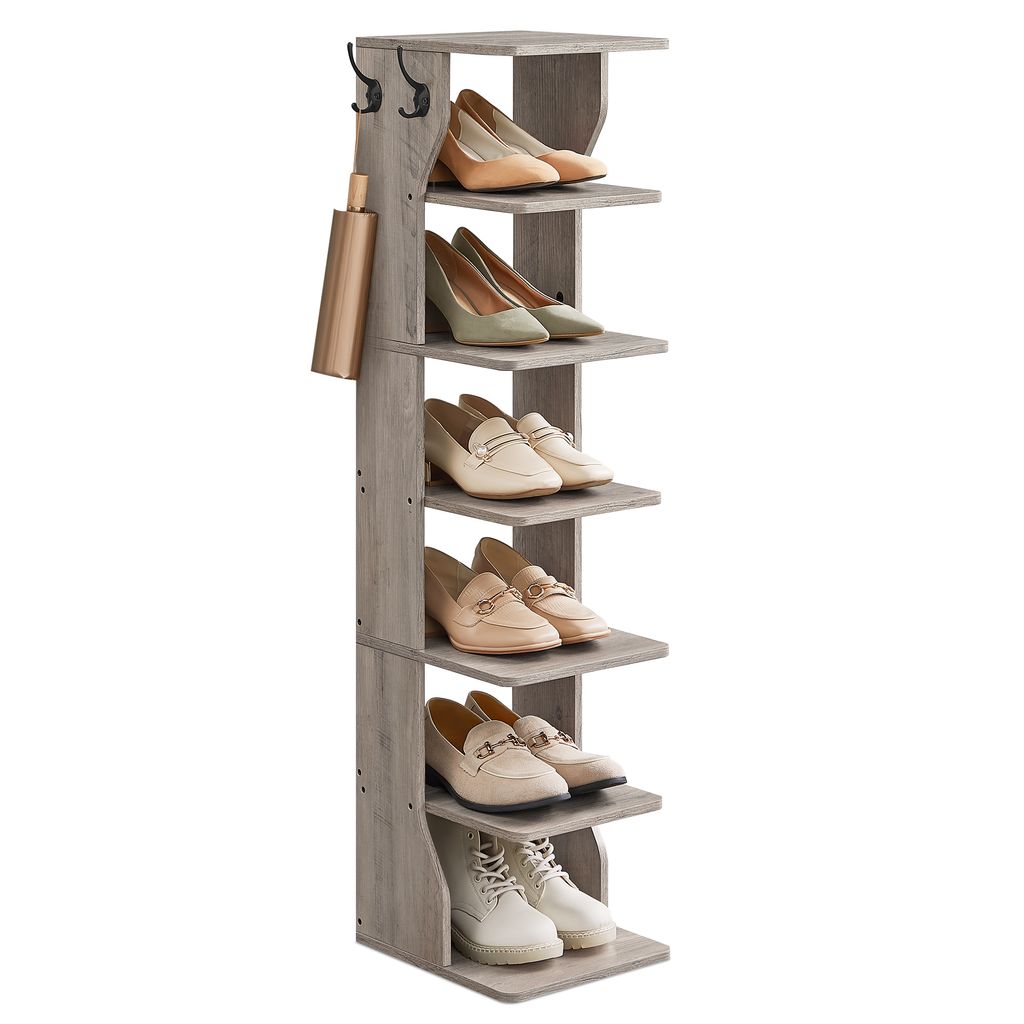A tall, narrow gray shoe rack with multiple shelves holds various pairs of shoes. There are also two hooks on the side of the rack.