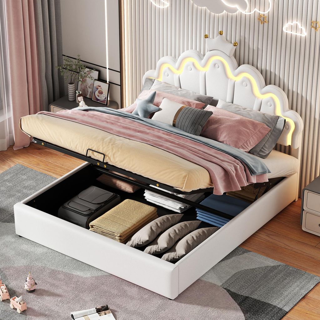 A child's bed with storage, featuring a cloud-shaped headboard with LED lights and a crown.