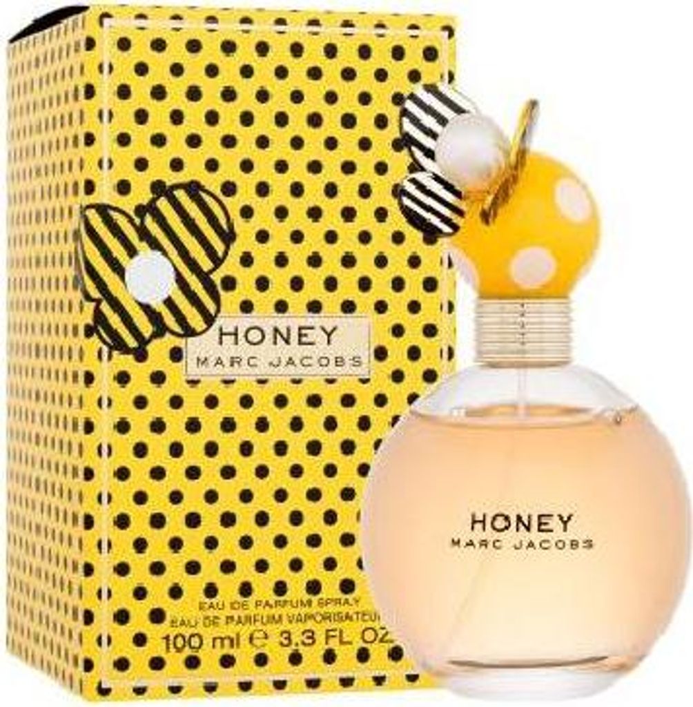 A bottle of Marc Jacobs Honey perfume and its packaging are displayed against a white background.