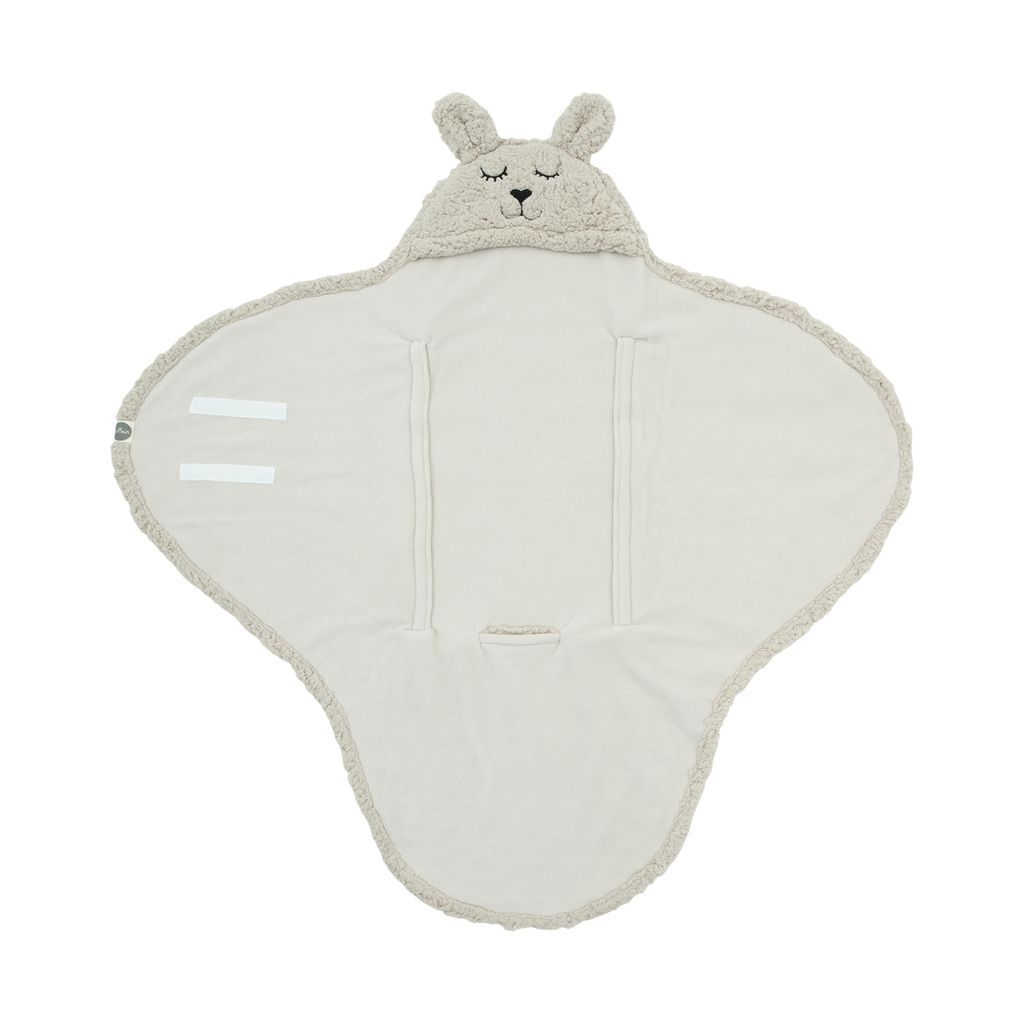 A baby swaddle blanket with a bunny hood, laid flat on a white background.