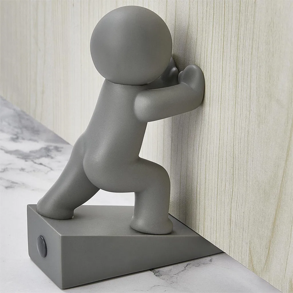 Bloque porte décoratif gris pour éviter les claquements dans la chambre