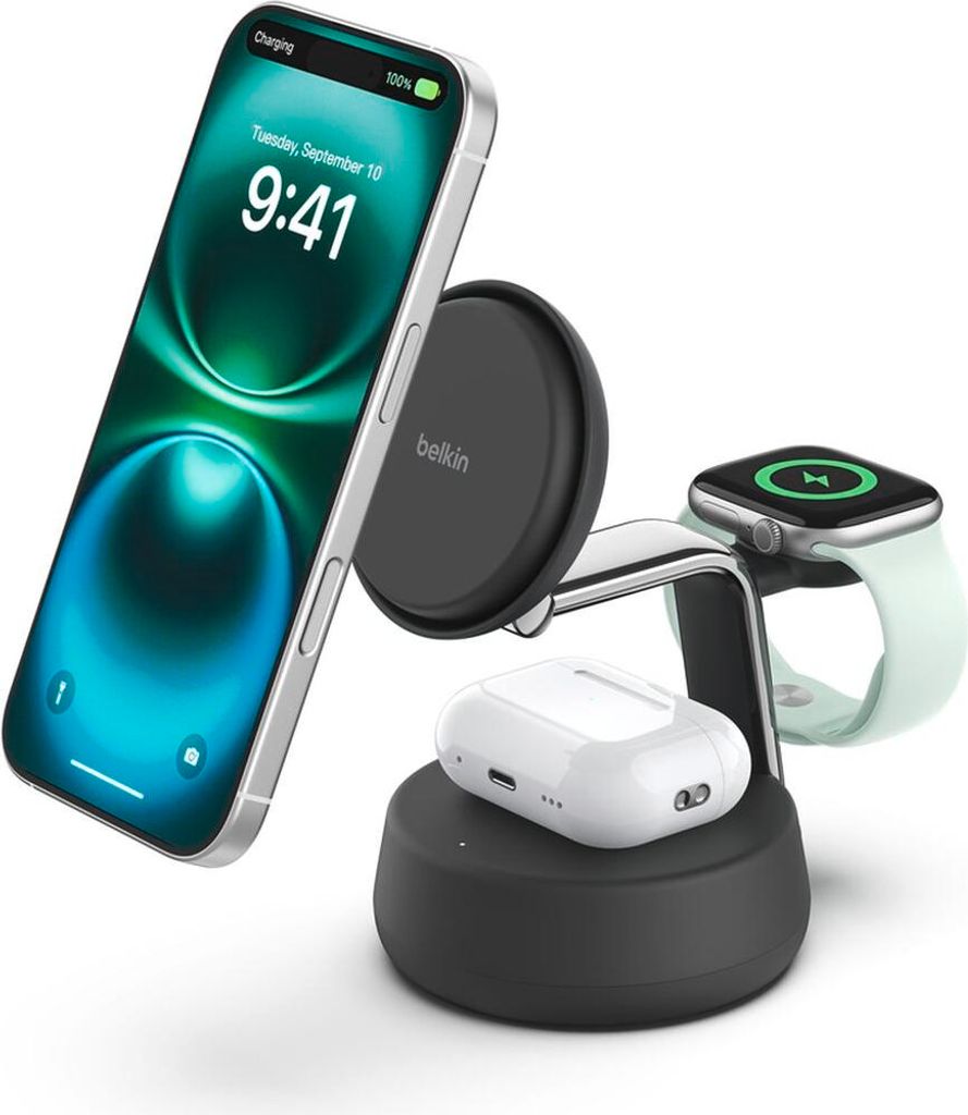 A white background with a charging station holding an iPhone, Apple Watch, and AirPods.