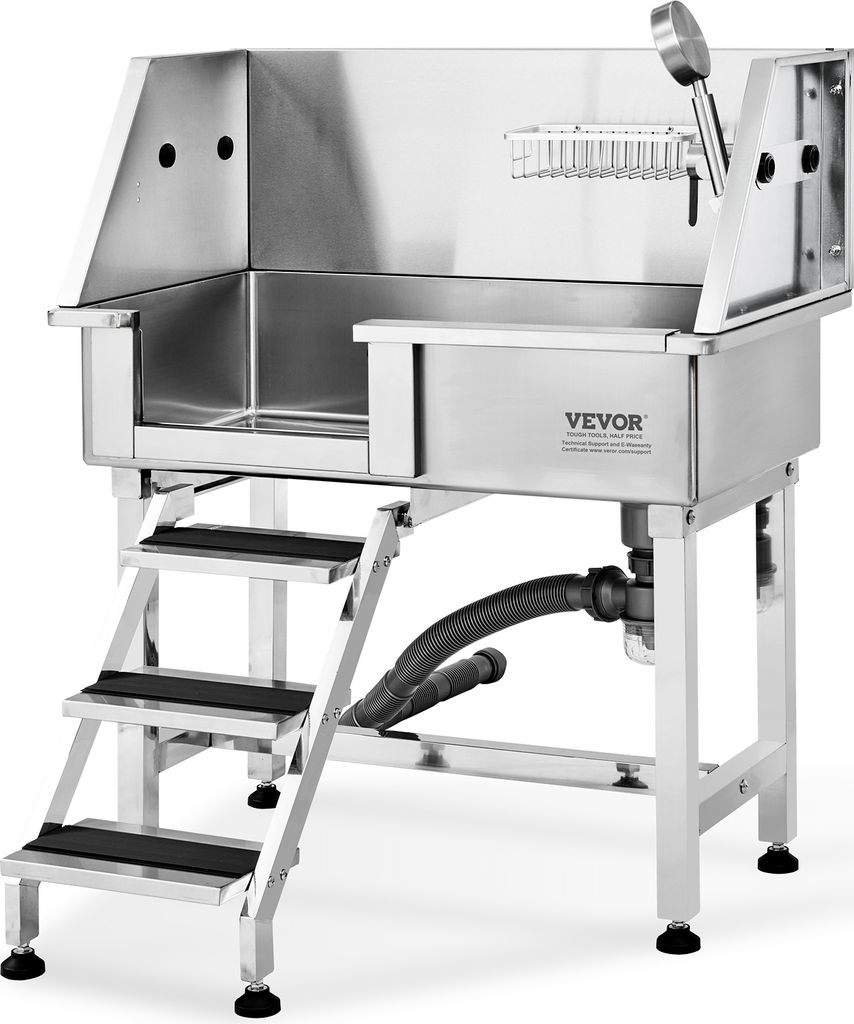 A professional stainless steel dog grooming tub with stairs and a shower head.