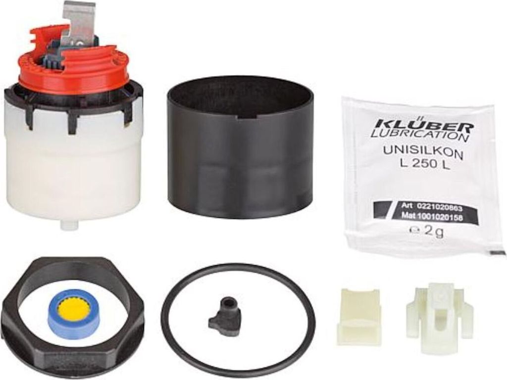 A collection of plumbing parts for a faucet cartridge.
