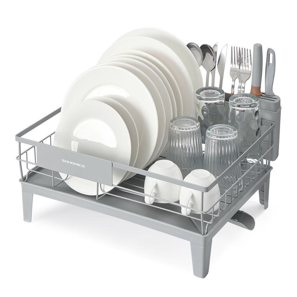 A dish drying rack filled with plates, glasses, and cutlery.