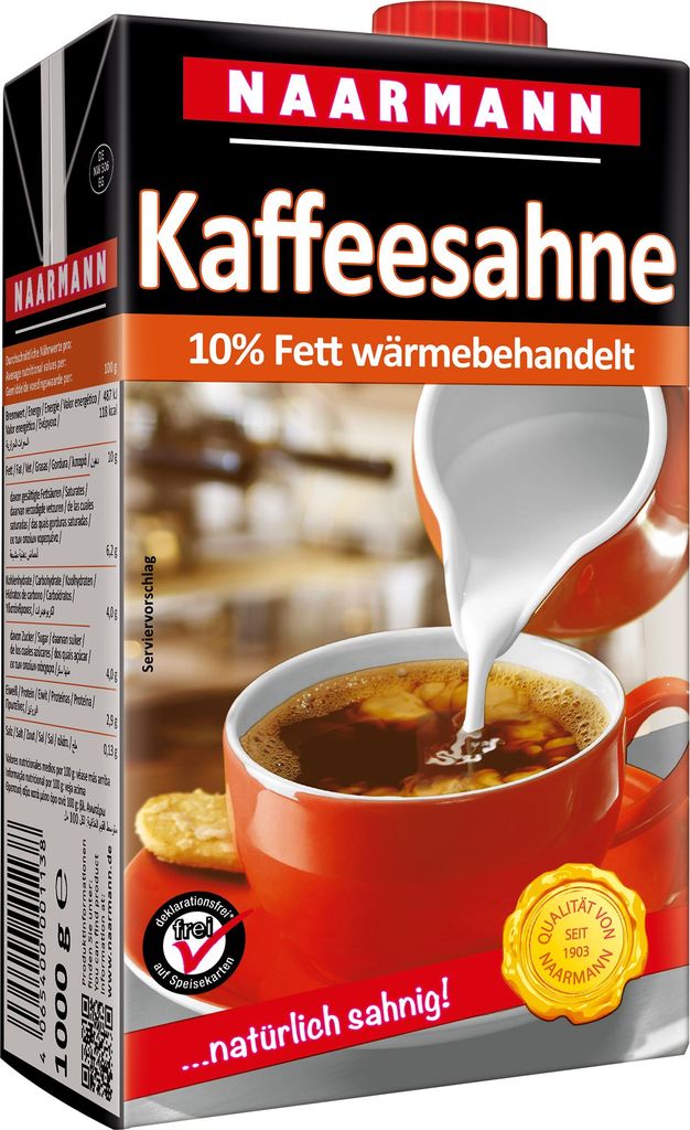A carton of coffee cream being poured into a cup of coffee.