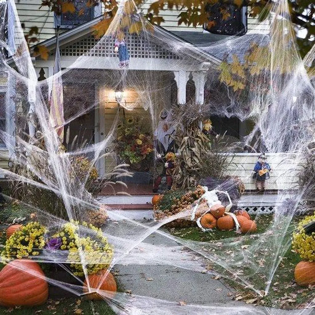 Toile d'araignée Halloween géante 140 m² avec 50 araignées : kit complet