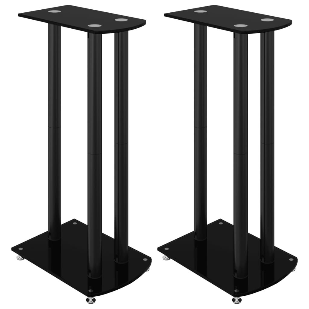 Two black speaker stands with glass bases and three columns are shown against a white background.