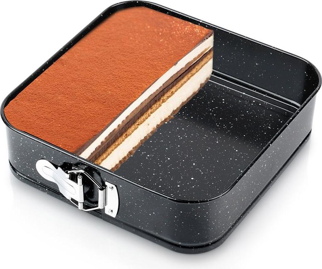 A slice of tiramisu cake in a square springform pan.