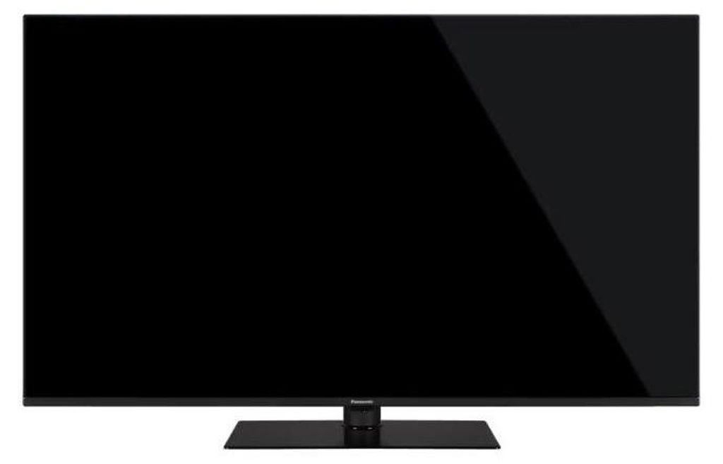 A black flat-screen television with a black stand is shown from the front.