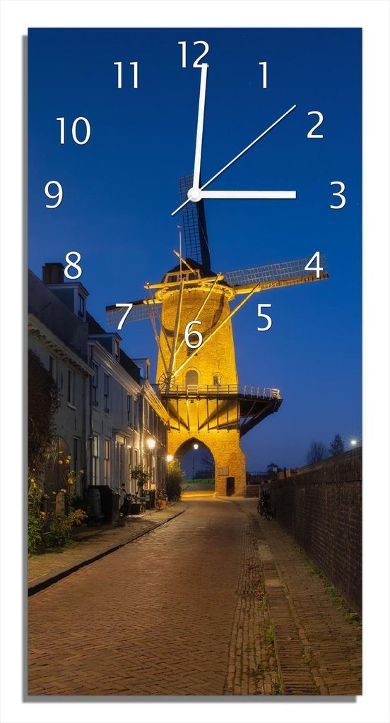 Wallario Design Wanduhr Windmühle bei Nacht aus Echtglas, Größe 30 x 60 cm