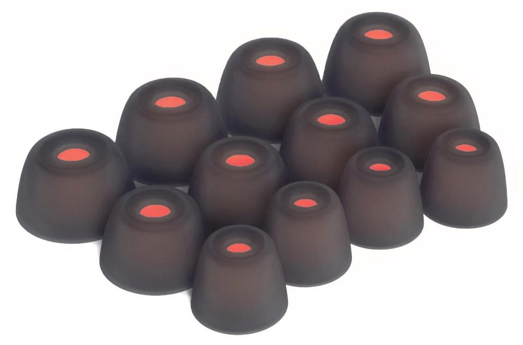 A collection of black silicone ear tips with red centers, arranged in a cluster on a white background.
