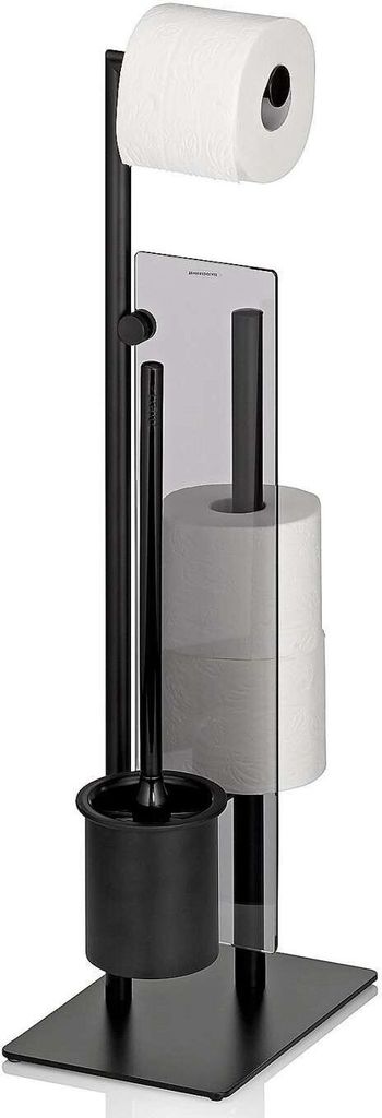 A black toilet brush and toilet paper holder stand with two rolls of toilet paper.