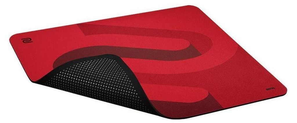 A red mousepad with a black textured underside is shown from a diagonal angle.