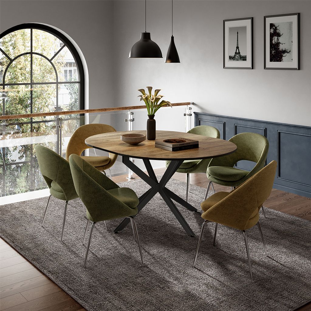 A dining room with a table and chairs, set up for a meal.