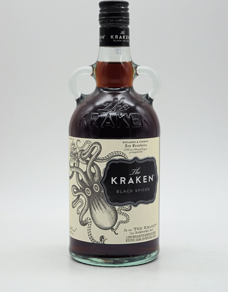A bottle of The Kraken Black Spiced Rum against a white background.