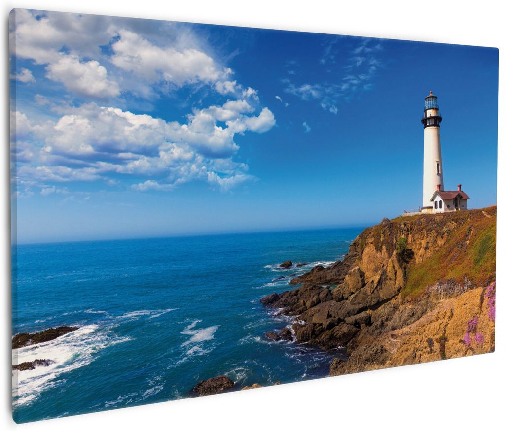 Wallario Premium Leinwandbild Leuchtturm auf einem Felsvorsprung - Blauer Himmel in Größe 60 x 90 cm