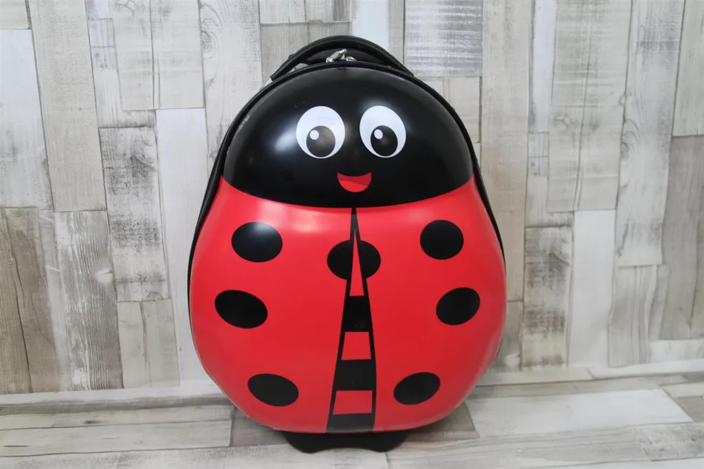 Valise Heys Lady Bug Travel Tots avec roues silencieuses et sac ergonomique