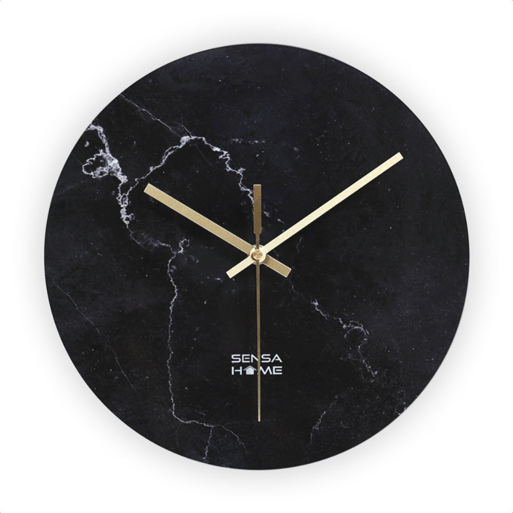 A round wall clock with a black marble design and gold hands.