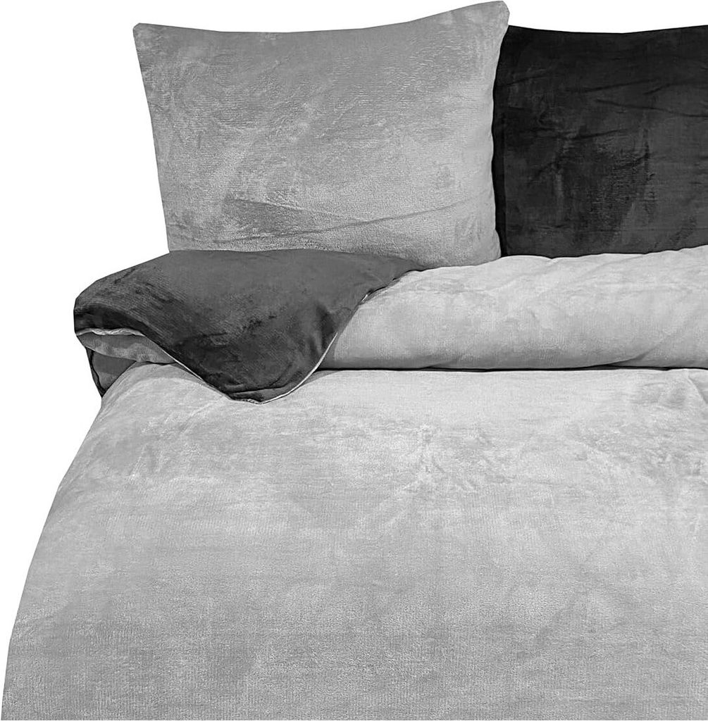 A close-up view of a bedding set, showing the texture and colors of the fabric.