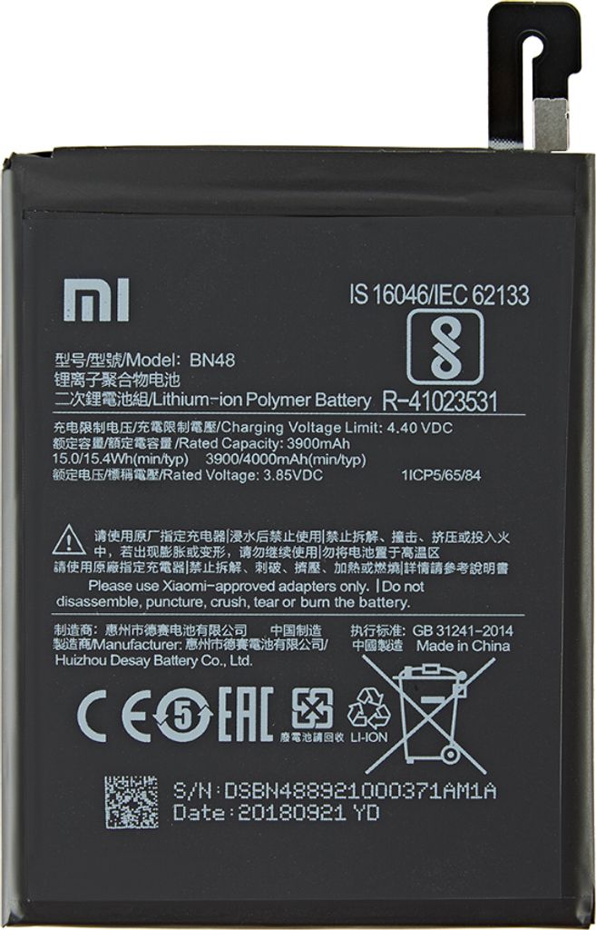 A black smartphone battery with labels and markings.