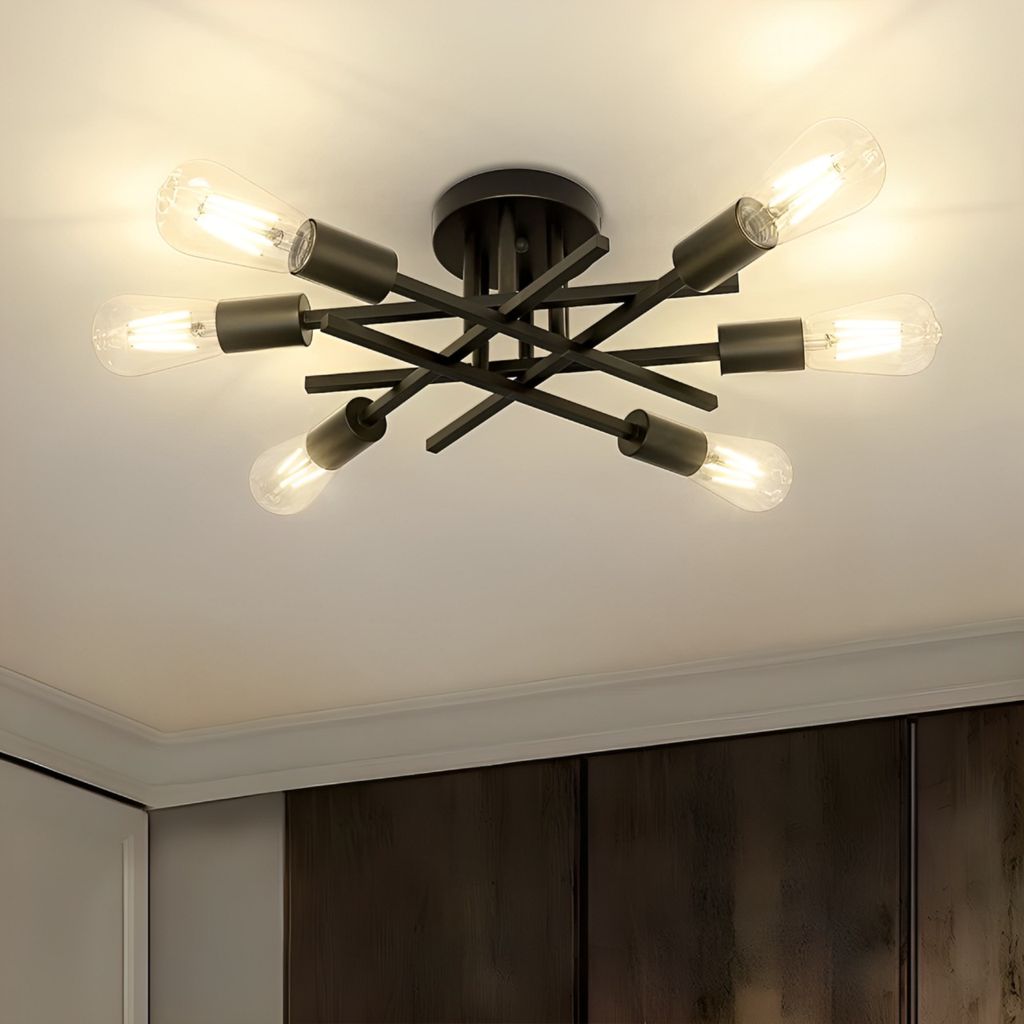 A black, multi-arm ceiling light fixture with exposed bulbs is shown against a white ceiling.