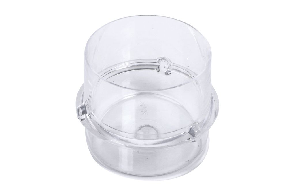 A clear plastic measuring cup is shown against a white background.