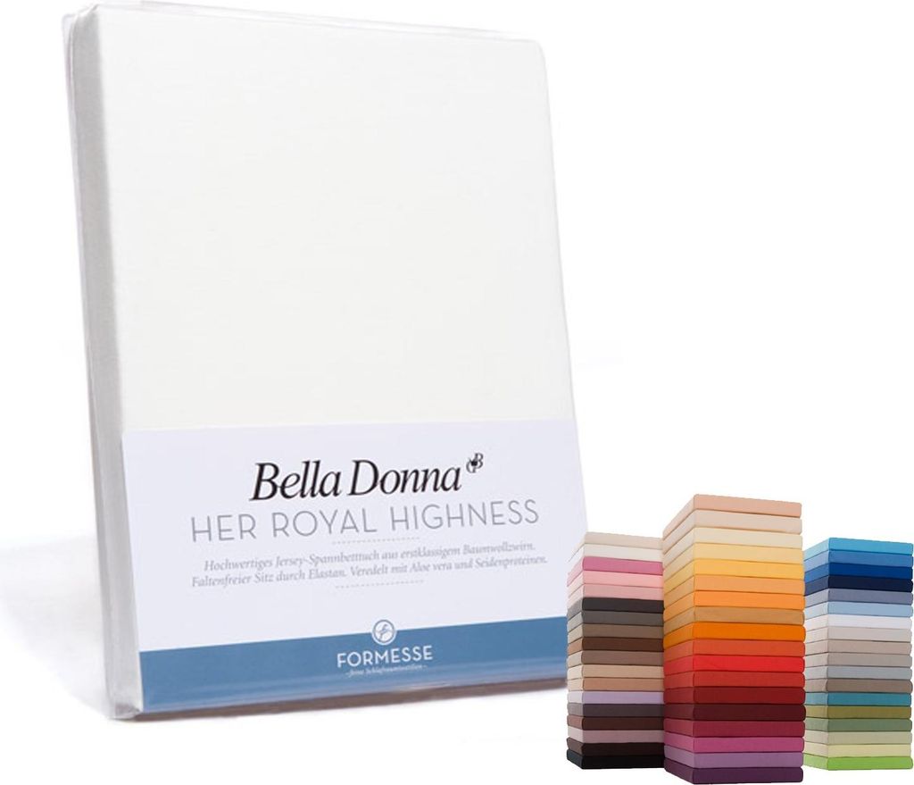 A white fitted sheet is shown standing upright, with a label indicating the brand and product name. To the right, a stack of fabric swatches in various colors is displayed.