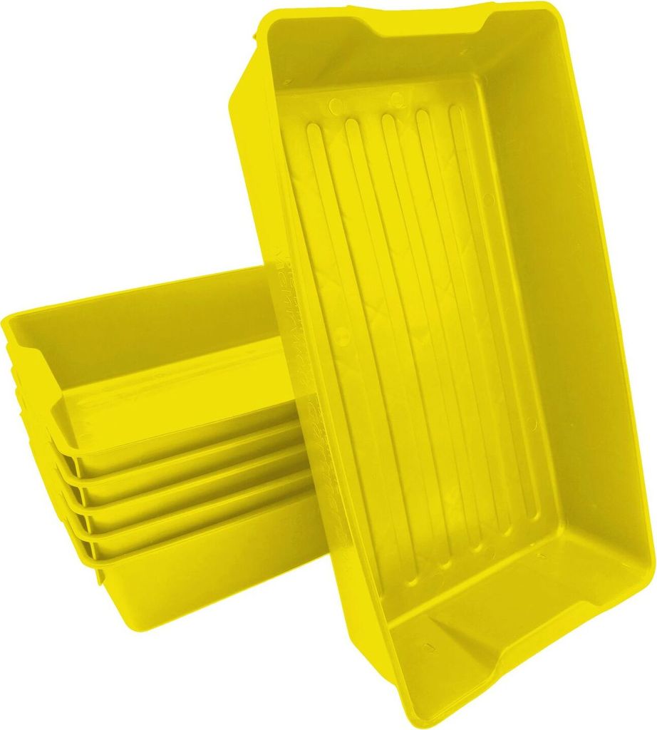 A stack of yellow plastic planting trays.