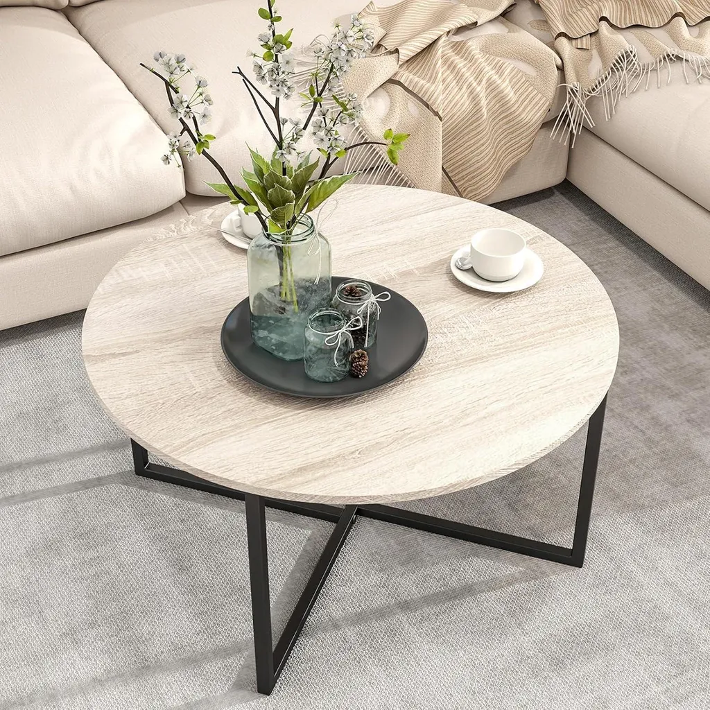 Table basse ronde pour salon industriel en bois noir et chêne naturel
