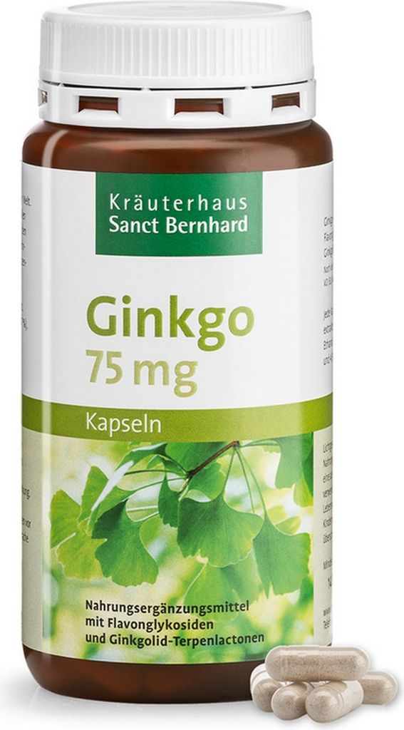 A bottle of Ginkgo capsules with some capsules scattered in front of it.