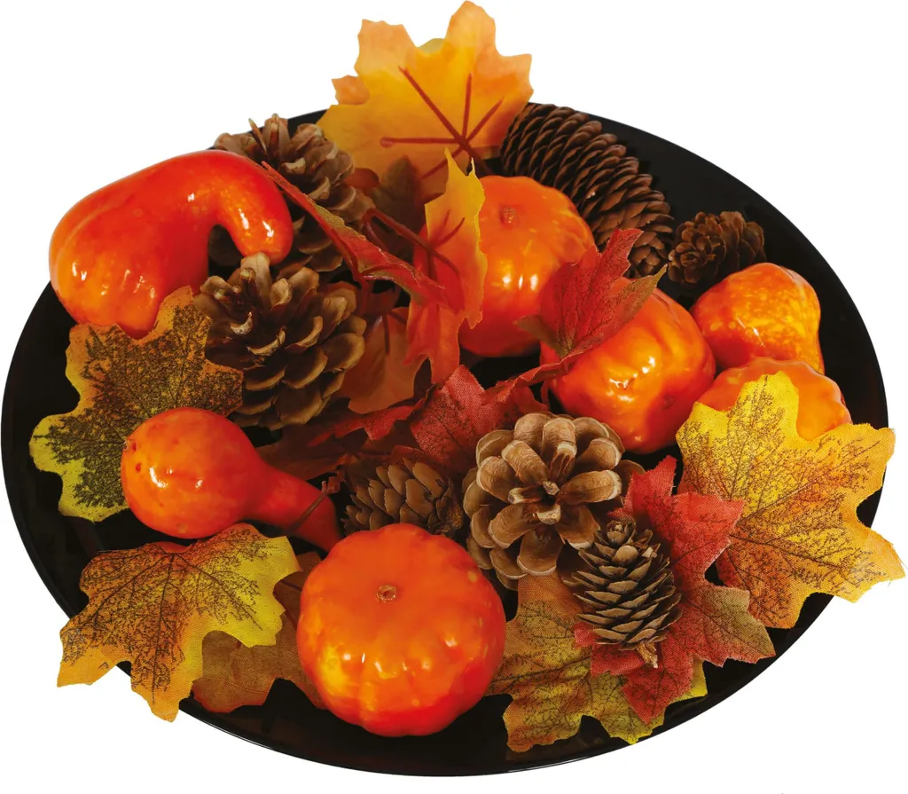 Décoration d'automne citrouilles oranges et éléments séchés naturels
