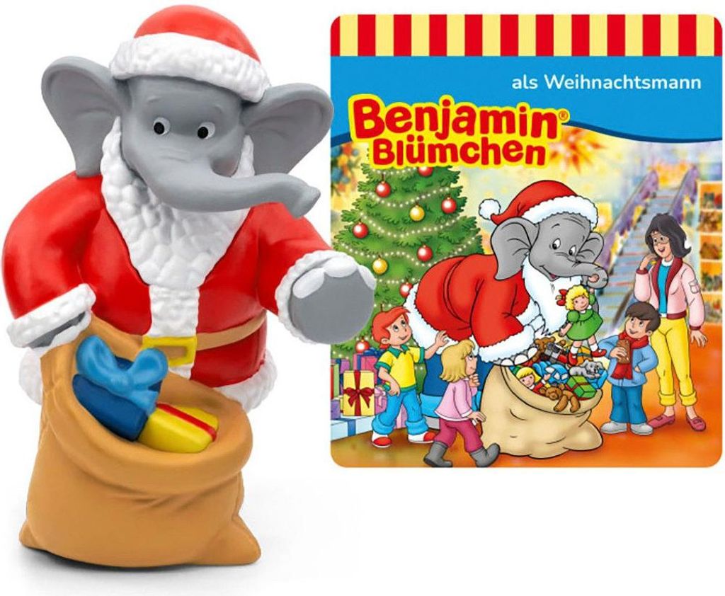 A toy elephant dressed as Santa Claus holding a sack of gifts, next to a book cover featuring the same character.