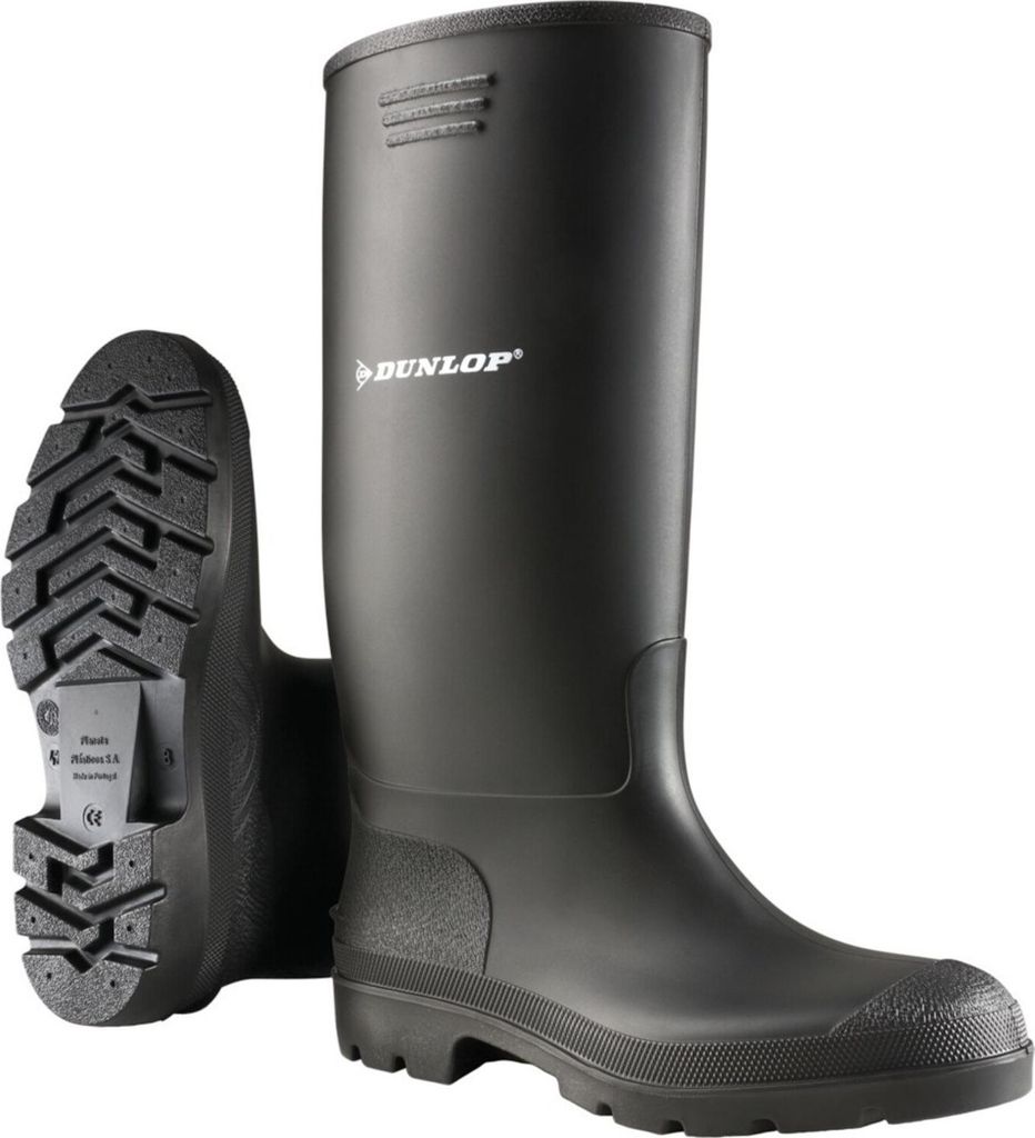 A pair of black Dunlop rubber boots shown from a slightly angled front view, with one boot standing upright and the other shown from the sole.