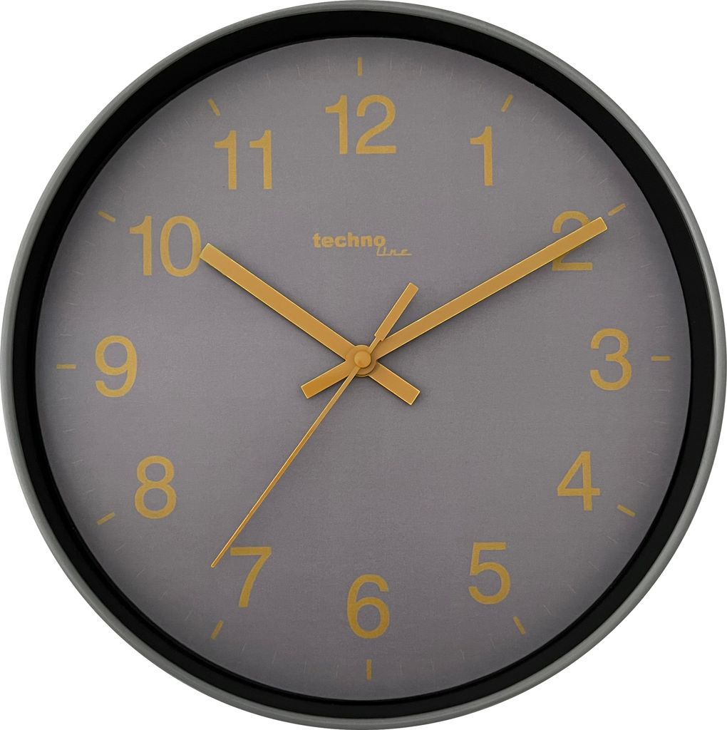 A close-up view of a wall clock with a gray face and yellow numbers and hands.