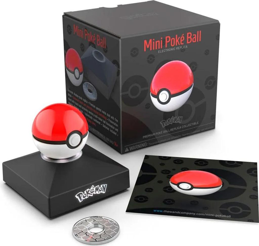 A Pokémon Mini Poké Ball electronic replica is displayed with its packaging and accessories.