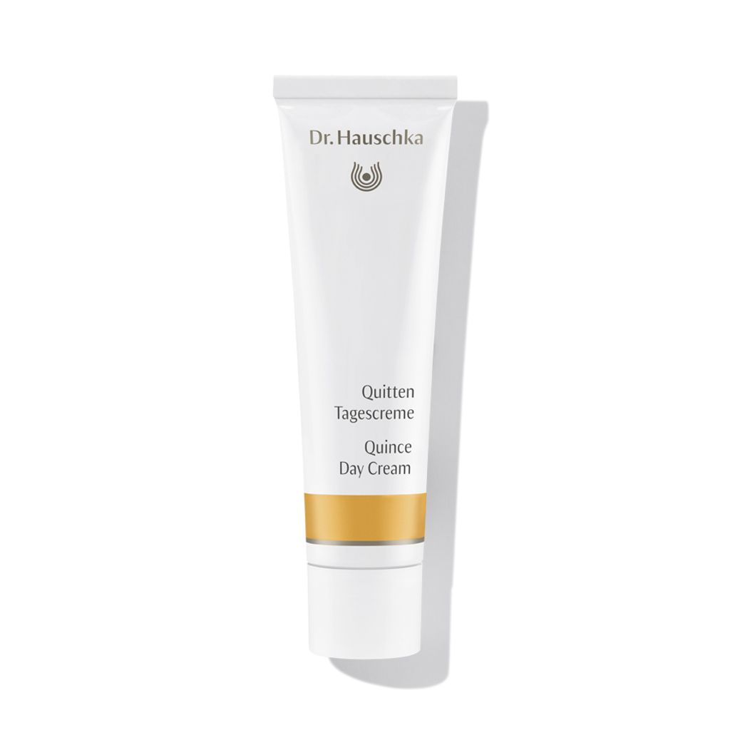 A product shot of a tube of Dr. Hauschka Quince Day Cream against a white background.
