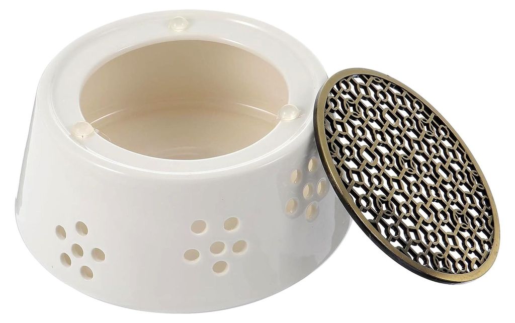 Keramischer Teewärmer mit porösem Design zur sicheren Wärmeerhaltung von Tee in Weiß