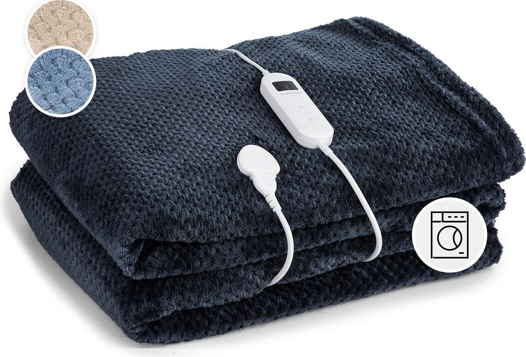 A folded navy blue electric blanket with a controller and two sample swatches of fabric in beige and light blue.