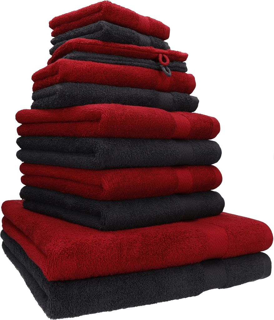 A stack of folded towels in red and black.