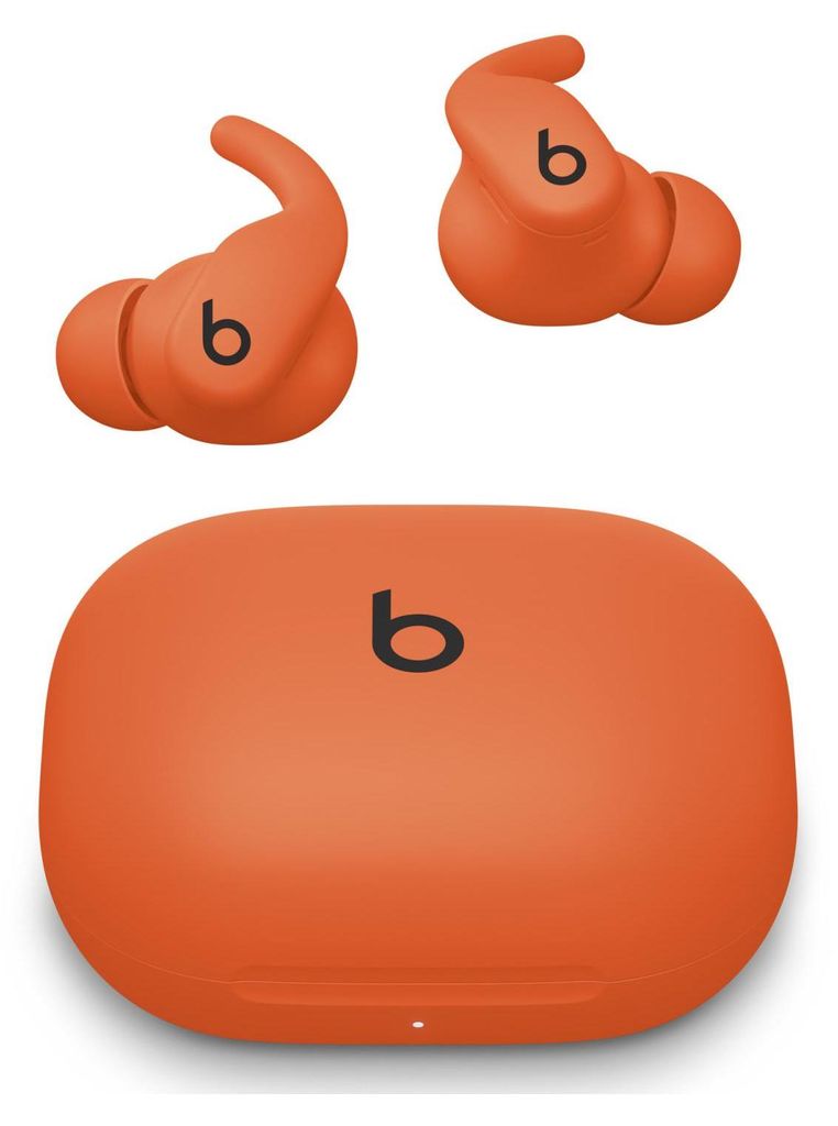 An orange Beats by Dr. Dre Powerbeats Fit wireless earbuds and charging case are displayed against a white background.