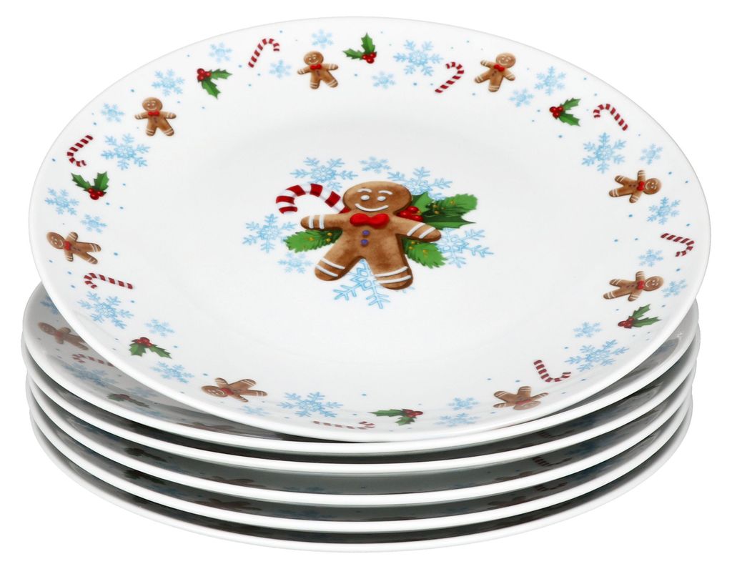 A stack of Christmas-themed plates with gingerbread man designs.