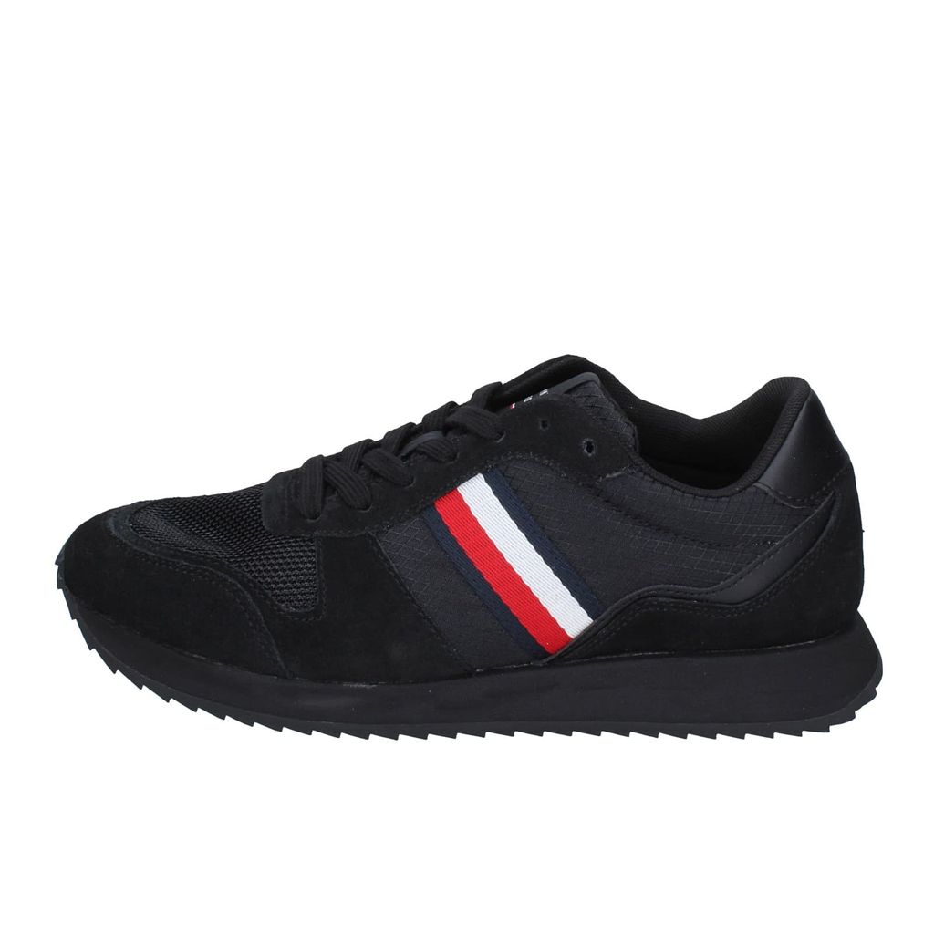 A single black sneaker is shown from the side against a white background.