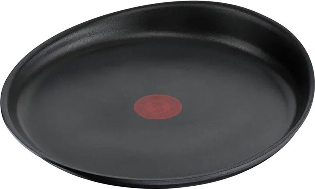 A black frying pan with a red indicator in the center, isolated on a white background.