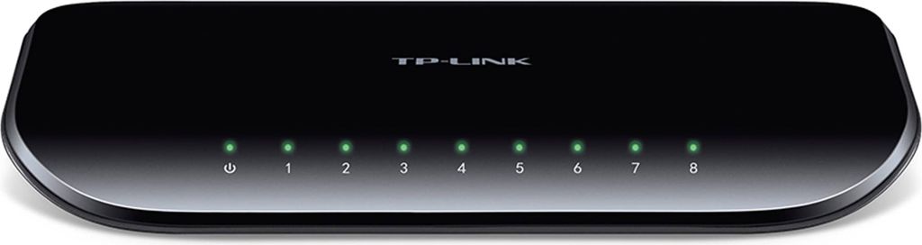 A black TP-Link network switch with eight ports, each indicated by a green LED light.